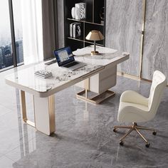 a desk with a laptop on it and a chair