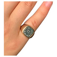 Classic Georgian style antique bloodstone intaglio and 9K rose gold signet ring. Late 19th Century The bloodstone intaglio of interconnected symbols and the letter W or M, depending on how you choose to wear it, set in a substantial solid rose gold setting. Beautiful pinky ring, lovely pairing of bloodstone and rose gold. Marks: C G maker's mark, 9 for 9K gold Condition: Very good, nice patina, this ring was professionally sized, tiny abraisions to the border of the bloodstone. Size: 3.25-3.5 US Signet Ring Silver, Letter W, Gold Signet Ring, Maker's Mark, Pinky Ring, Signet Ring, Ring Silver, 19th Century, Patina