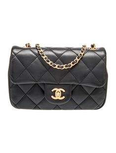 Chanel Messenger BagFrom the 2022 Collection by Virginie ViardBlack LambskinInterlocking CC Logo, Quilted Pattern & Chain-Link AccentGold-Tone HardwareChain-Link Shoulder StrapSingle Exterior PocketLeather Lining & Single Interior PocketTurn-Lock Closure at FrontIncludes Box & Dust Bag Chanel Mini Flap Bag, Chanel Mini, Quilted Pattern, Saint Laurent Bag, Mini Heart, Work Bags, Bag Handle, Cc Logo, Accessories Jacket