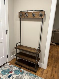 Function and design in one with our industrial farmhouse hall tree. Thick solid wood shelves and genuine black iron pipes create the sturdy frame to turn your entryway or mudroom into an inviting organized area. Strong coat hooks provide storage for coats, bags, hats and the bench has space for baskets, pillows, decor, or shoes. Home Made Coat Racks, Mudroom Backpack Organization, Coat Hanger Ideas, Farmhouse Hall Tree, Industrial Hall Tree, Industrial Hall, Style Entryway, Entryway Hall Tree, Diy Coat