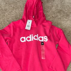 Bright Pink In Color. Size Medium Hooded Tops With Logo Print For Spring, Adidas Sportswear Tops With Letter Print, Red Sportswear Tops For Spring, Red Spring Sportswear Tops, Spring Sportswear Tops In Red, Spring Sports Sweatshirt With Logo Print, Spring Letter Print Sportswear Sweatshirt, Adidas Logo Print Tops For Fall, Spring Adidas Sweatshirt For Sports