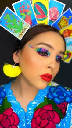 a woman with bright makeup and colorful accessories on her head