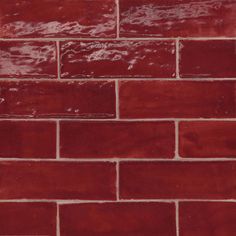 a red brick wall that is very close to the ground