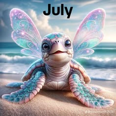 a little turtle sitting on top of a sandy beach next to the ocean with a caption that reads, july