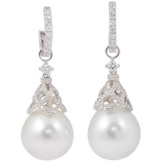 18K White Gold 4.2 g. South Sea Pearls 13-14 mm each 0.95 Diamonds 1.5 " long South Sea Pearls Earrings, White Gold Diamond Earrings, White Gold Hoops, Black Earrings Dangle, White Pearl Earring, Deco Earrings, Sparkly Jewelry, Pearl And Diamond Earrings, Diamond Dangle Earrings