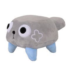 a gray stuffed animal with big eyes