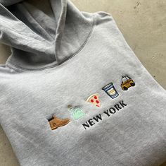 Embroidered  NYC Symbols True to Size Nyc Symbols, Nyc Hoodie, Nyc Outfits, Embroidered Sweatshirt, Embroidered Hoodie, Embroidered Sweatshirts, Design Inspo, Gender Neutral, Bathing Beauties