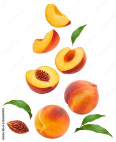 peaches with leaves and slices cut in half