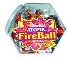 atomic fireball candy in a plastic container