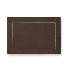 brown linen placemat with white stitching