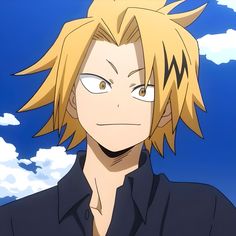 an anime character with blonde hair and black shirt looking at the camera while standing in front of clouds