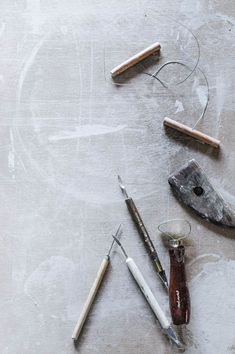 some tools are laying out on a table