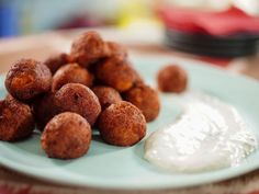 some food is sitting on a plate and ready to be eaten with cream cheese in the background