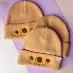 The softest cute cottagecore suntflower hat to remind you of summer even in the cold winter days🌻 One size - measures around 21cm (8in) laid flat. It has a decent amount of stretch so it should suit most people!🌻 This hat is custom made using high quality materials and embroidered in house by me!  Made of a real merino wool and acrylic blend, this hat is incredibly soft and warm. Merino wool is known to be non scratchy and durable! The acrylic and nylon are used to offer some elasticity and to Cute Cream Beanie Hat, Cute One Size Fits Most Beanie, Cute Cotton Beanie Cap, Cute Cotton Cap Beanie, Adjustable Spring Beanie Cap, Cute Cotton Beanie, Cute Cotton Hat, Cute Cotton Hat One Size, Cute Warm Cotton Hat