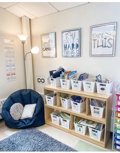 a child's playroom with toys and books on the shelves in front of it