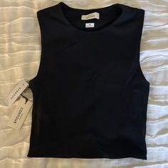 Aritzia Contour Muscle Tank In Black In Size Xs. Never Worn New With Tags Black Fitted Tank Top For Night Out, Fitted Black Tank Top For Night Out, Fitted Crew Neck Tank Top For Night Out, Chic Black Crew Neck Tank Top, Black Fitted Tank Top With Crew Neck, Black Fitted Crew Neck Tank Top, Chic Black Cropped Tank Top, Black Fitted Crop Top Tank, Fitted Black Crop Top Tank Top