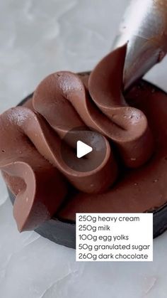 a person is spreading chocolate on top of something