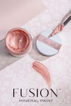 a close up of a jar of makeup on a table with the words, fuson mineral paint