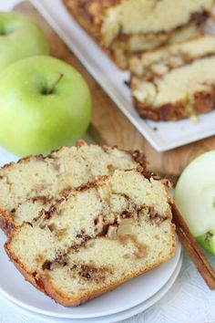 slices of apple bread on plates next to sliced apples