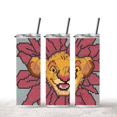 two can coolers with the face of a lion on them, both decorated in pink and