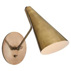 an image of a wall light that is on the side of a white wall with a gold shade