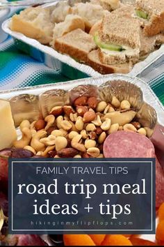 the road trip meal is ready to be eaten and served on plates with fruit, crackers and bread