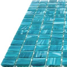 a blue glass mosaic tile on a white background