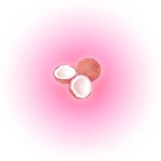 two coconuts on a pink and white background with one cut in half to show the inside