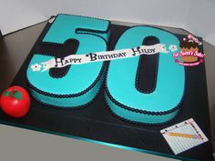 a birthday cake with the number sixty on it and an apple next to it for someone's 50th