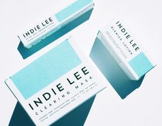 two business cards sitting on top of each other with the word indie lee in front of them