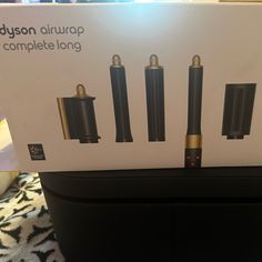 the box has four different types of electronic devices in it's packaging, including one that is black and gold