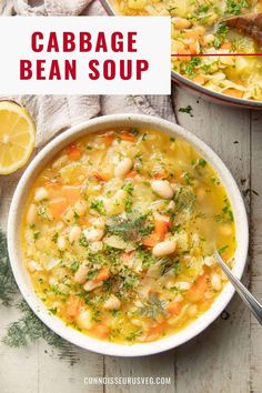 cabbage bean soup in a bowl with lemons and parsley