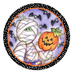 a plate with a drawing of a skeleton wrapped around a pumpkin