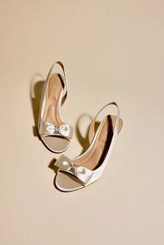 Satin and Rhinestone Bow DOrsay Kitten Heels | David's Bridal Rhinestone Bow, Book An Appointment, Davids Bridal, Kitten Heels, Buy Online, Satin, How To Wear