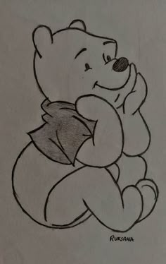 a drawing of winnie the pooh sitting down