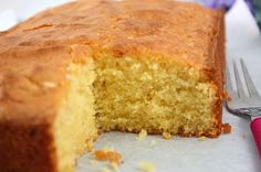 a close up of a cake on a plate with a fork