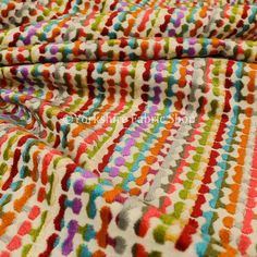 multicolored knitted fabric with wavy lines