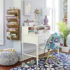 a child's desk and chair in a room