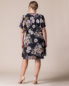 You'll feel carefree and flirty in our Florence Flutter Sleeve Dress. An easy dress that can be styled up or down, you'll feel comfortable in a flattering empire waist and flowy sleeves. Wear it to an upcoming wedding with heels or dress it with sneakers for brunch. Made exclusively in women's plus sizes. Jumpsuit And Cardigan, Dresses For Summer, Chic Cardigan, Easy Dress, Peony Print, Evening Gown Dresses, Clothing Sites, Flowy Sleeves, Cute Heels