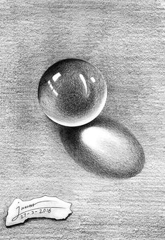 a pencil drawing of two rocks and a piece of paper