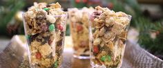 two cups filled with cereal sitting on top of a table