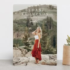 a photo of a woman in a red dress is on the cover of a book