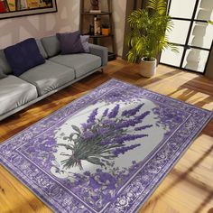 a living room with a couch and rug on the floor