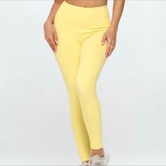 Set Active Stretch Hight Quality Leggings/Tops Solid Mid-rise Activewear For Spring, Summer Workout Leggings, High Rise Yoga Bottoms For Spring, Spring High-rise Yoga Bottoms, High Rise Solid Activewear For Spring, High Waist Workout Bottoms For Spring, Spring Workout High-waist Bottoms, Yellow Stretch Bottoms For Yoga, Yellow Stretch Yoga Bottoms