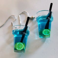 Blue Hawaii Drink With Lemon Slice Dangle Earrings Super Fun & Cute Dangle Earrings Made To Look Like Mini Drink Cups With Little Black Straw In Each Cup. Brand New In Original Packaging. These Resin Drink Earrings Are Made Of Eco-Friendly Acrylic Material, Non-Toxic And Safe, Durable And Lightweight. Bundle To Save! Blue Hawaii Drink, Weird Earrings Aesthetic, Odd Earrings, Odd Jewelry, Drink Earrings, Weird Earrings, Cute Dangle Earrings, Weird Jewelry, Pretty Accessories