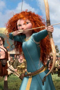 a woman with red hair is holding a bow and arrow in front of other people