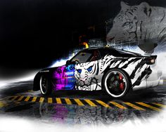 the car is painted with an image of a tiger on it's front end