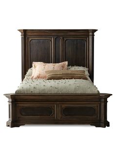 a bed with two drawers underneath it and a pillow on top of the headboard