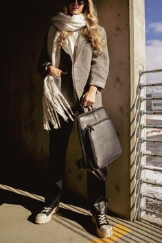 Elevate your travel game with the sleek and stylish Olivia Backpack's Midnite Edition! Travel In Style, Hand Sanitizer, Laptop Bag, In Style, The Go, Sleek, Laptop, Travel