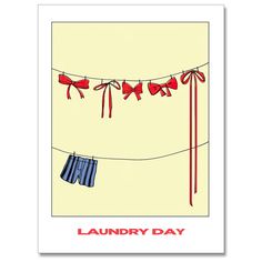 a laundry day card with shorts hanging on a line